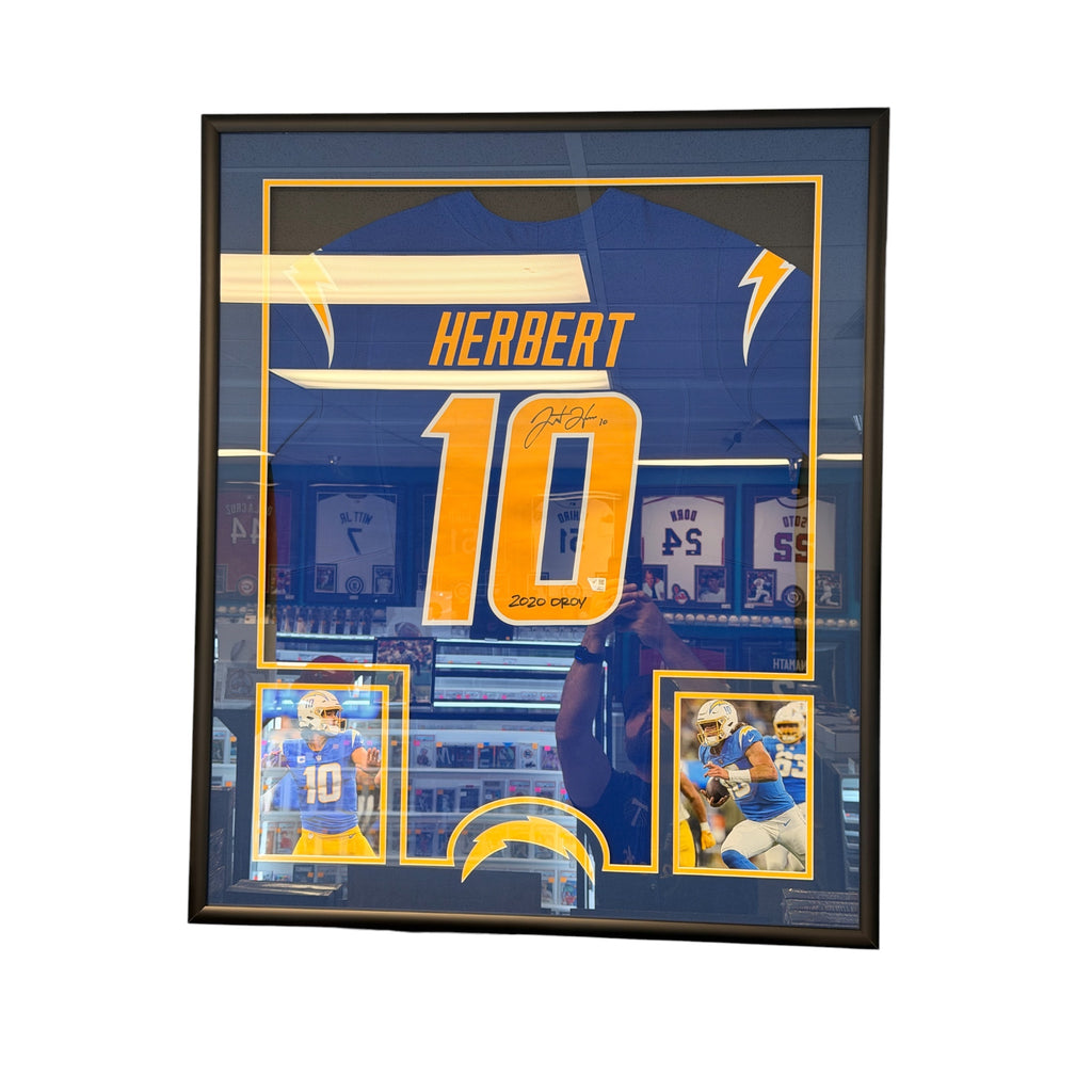 Justin Herbert Autographed & Inscribed “2020 OROY” Chargers #10 Framed Jersey – Fanatics Authentic