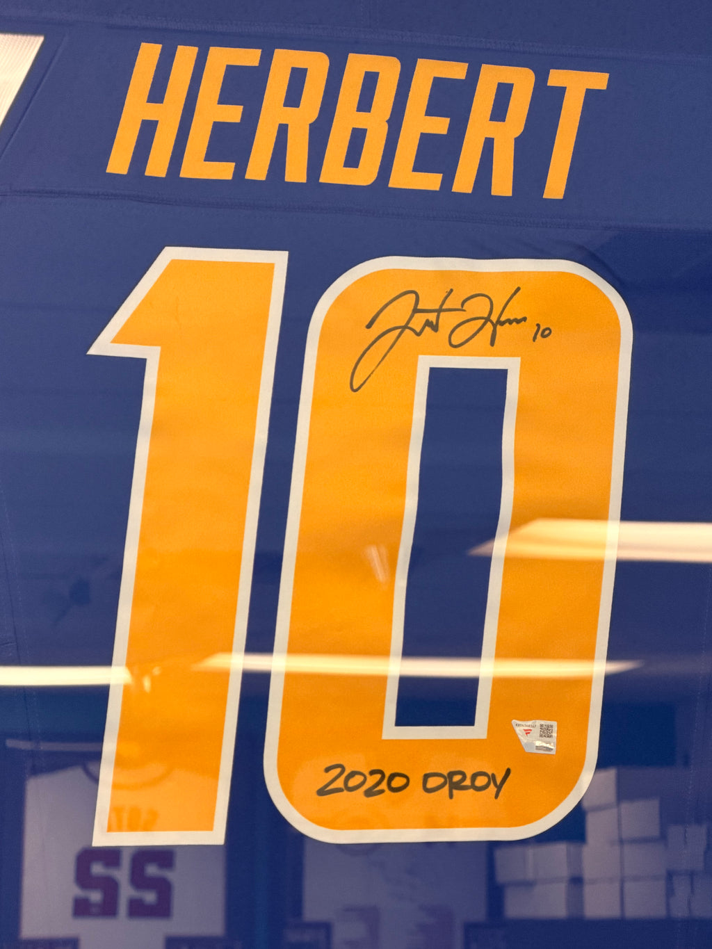 Justin Herbert Autographed & Inscribed “2020 OROY” Chargers #10 Framed Jersey – Fanatics Authentic